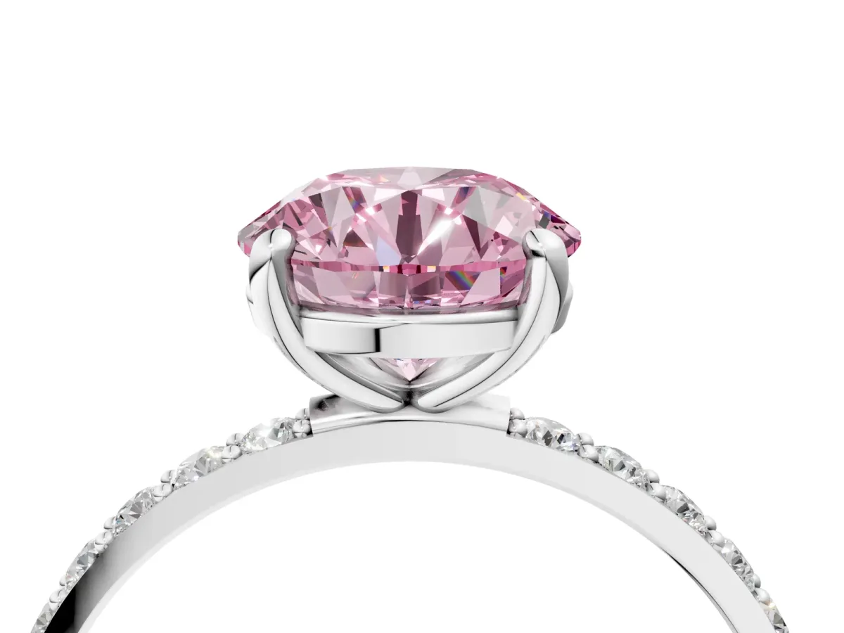 Fancy Pink Round Cut Diamond Solitaire Ring with Round Pavé Band and Prong Setting Silver