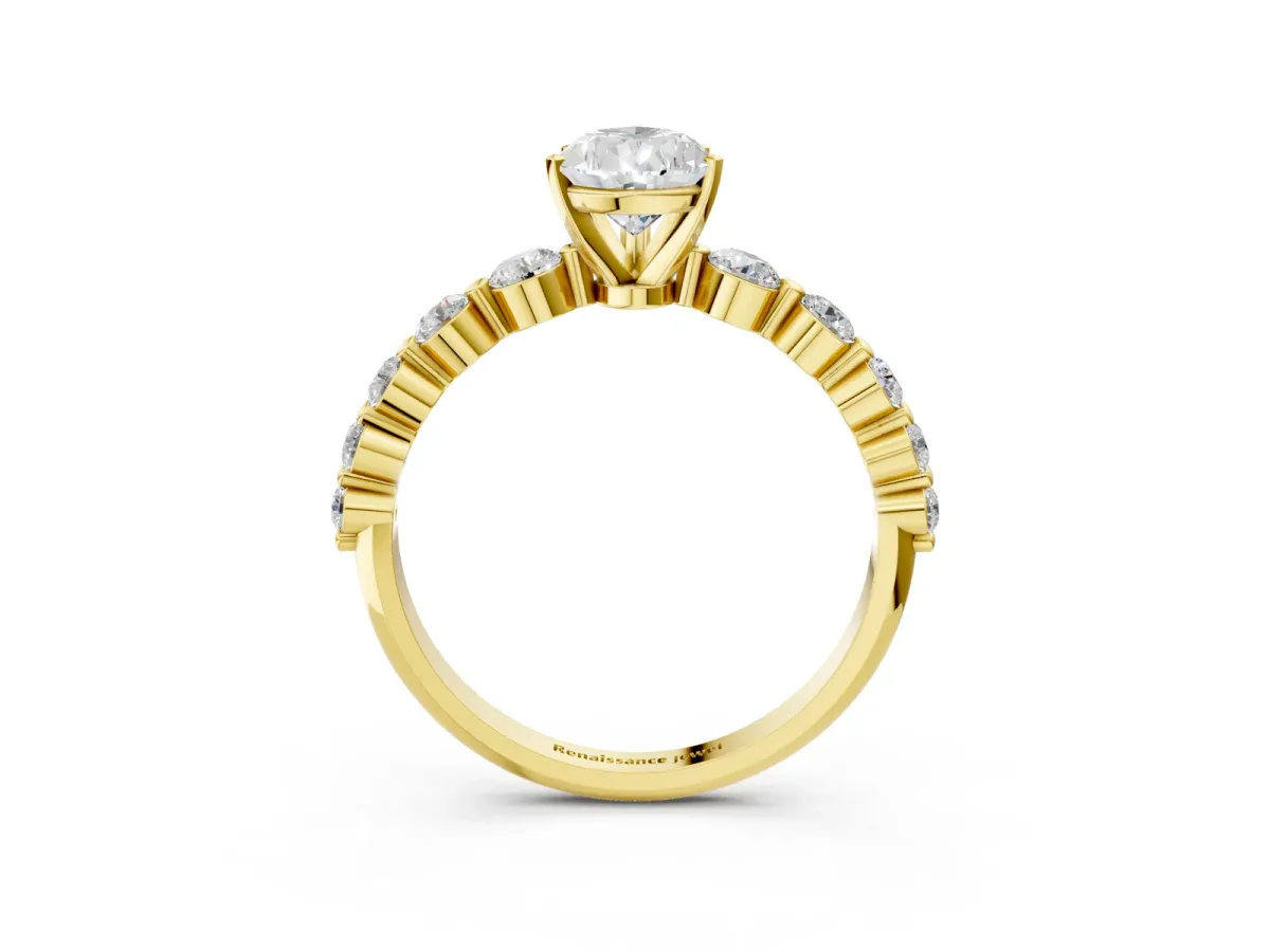 Pear Cut Solitaire Diamond Ring with Pave Band and Four-Prong Setting Yellow gold