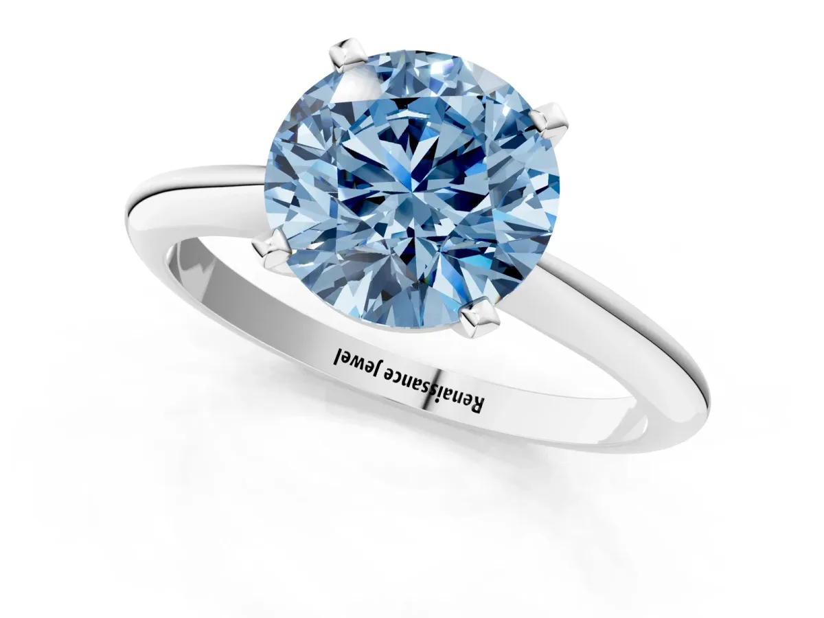 Fancy Blue Round Cut Diamond Solitaire Engagement Ring with Classic Band and Four-Prong Setting Silver