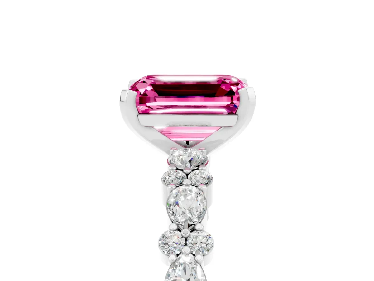 Emerald Cut Pink Sapphire Side Stone Solitaire Ring with Round and Four-Prong Setting White gold