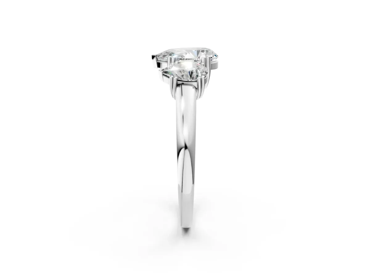 Three-Stone Pear Cut Cut Diamond Ring with Channel Set Band and Four-Prong Setting White gold