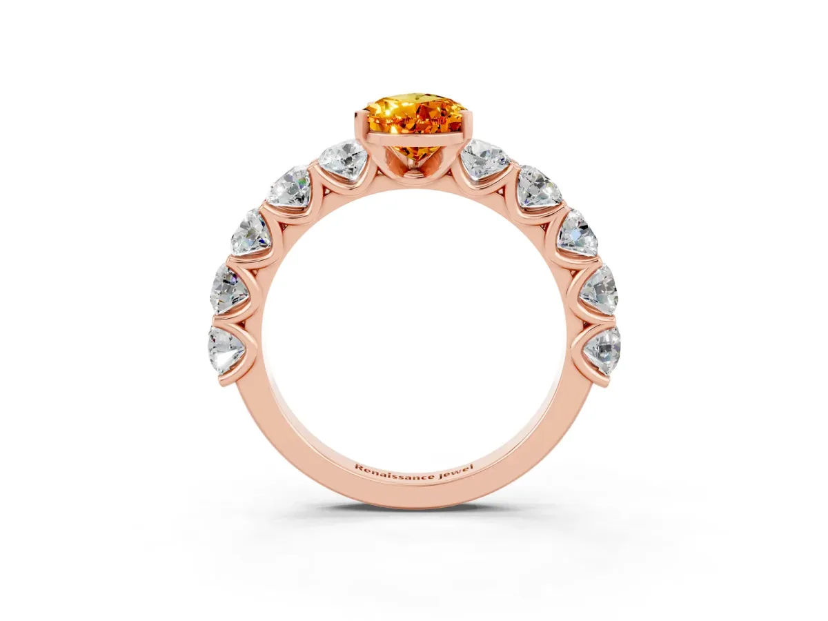 Pear Cut Citrine Prong Setting with Side Stones on a Pave Band Rose gold