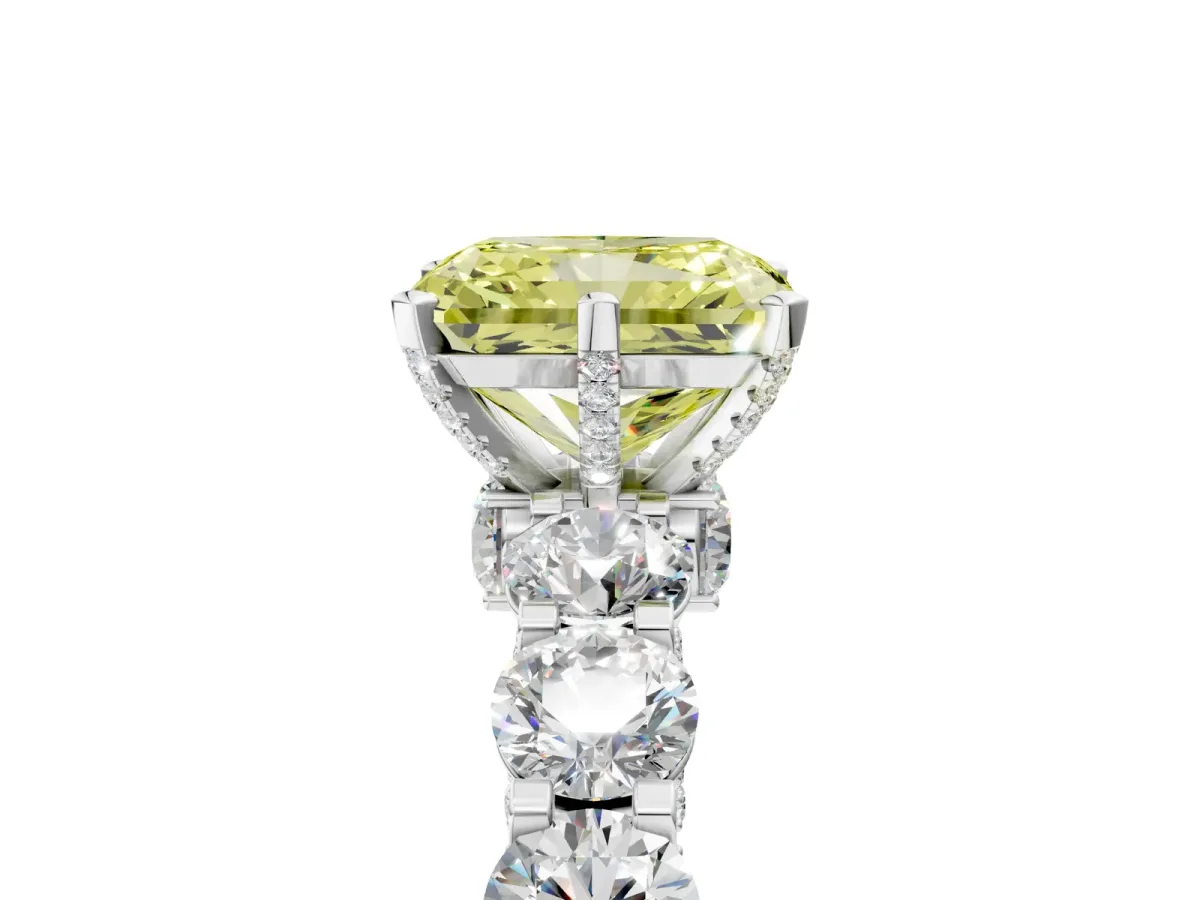 Fancy Yellow Radiant Cut Diamond Side Stone Engagement Ring with Four-Prong Setting White gold