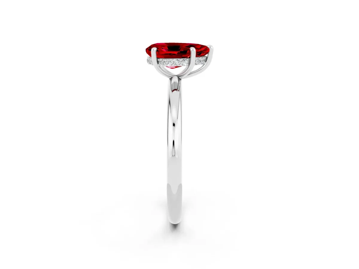 Pear Cut Ruby Solitaire Ring with Thin Band and Four-Prong Setting Silver