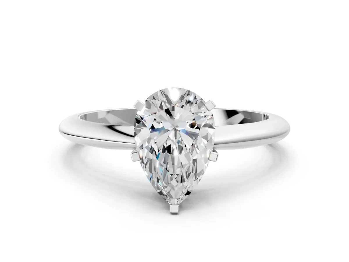Pear Cut Diamond Solitaire Engagement Ring with Classic Band and Four-Prong Setting Silver