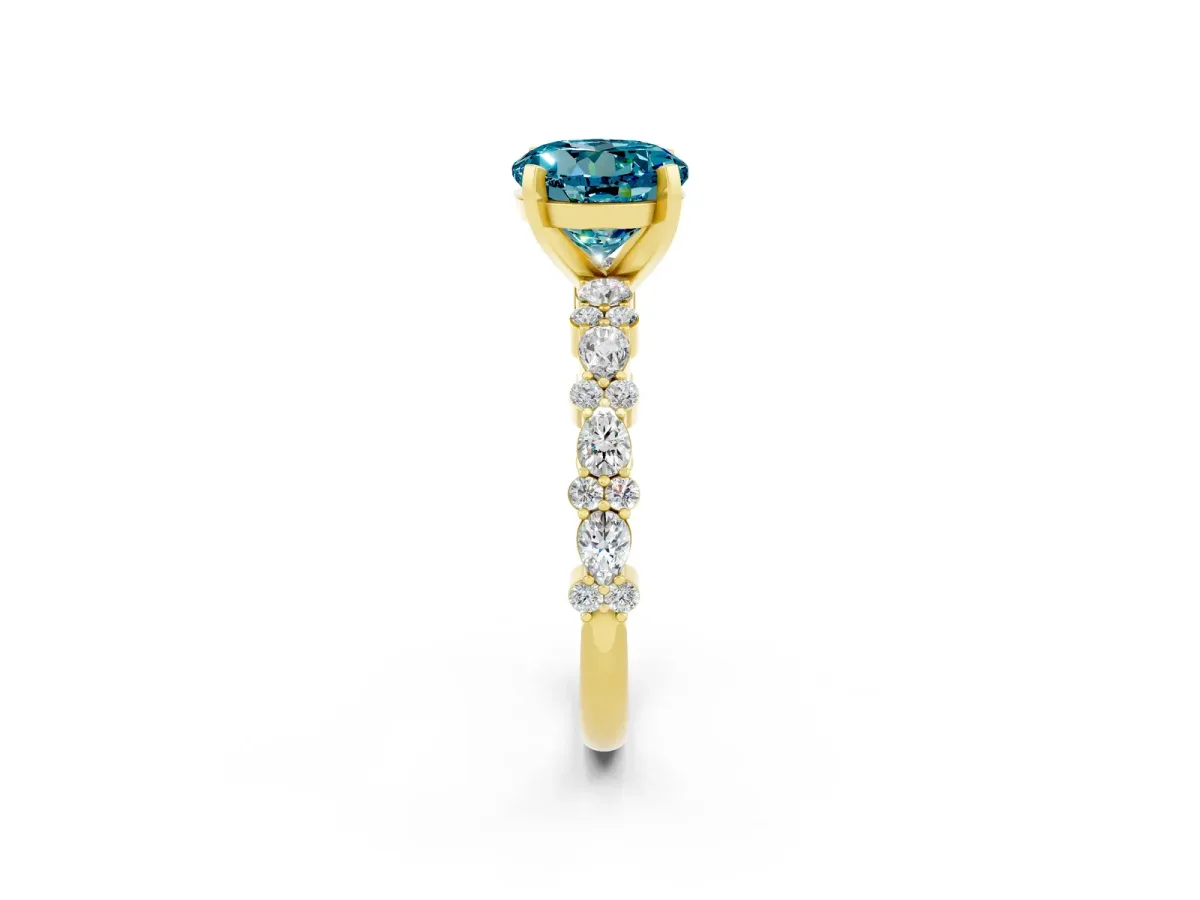 Round Cut Blue Topaz Side Stone Solitaire Ring with Round and Four-Prong Setting Yellow gold