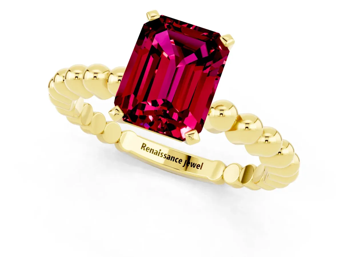 Emerald Cut Garnet Solitaire Ring with Beaded Band and Prong Setting Yellow gold