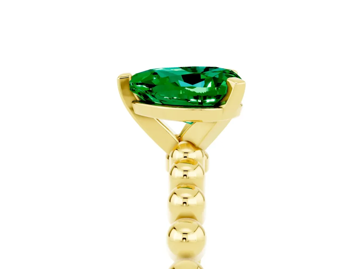 Heart Cut Emerald Solitaire Ring with Beaded Band and Prong Setting Yellow gold
