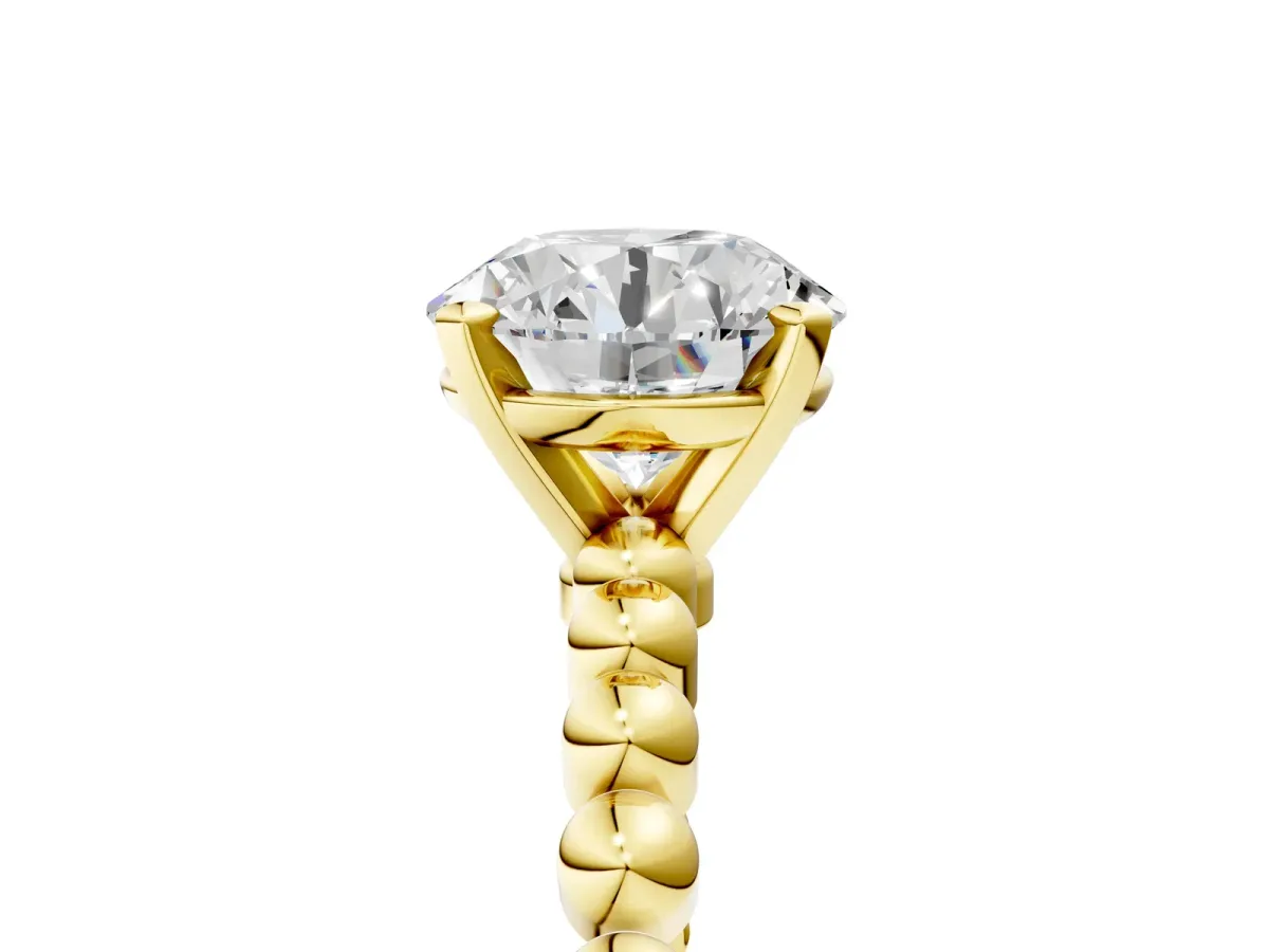 Round Cut Diamond Solitaire Ring with Beaded Band and Prong Setting Yellow gold