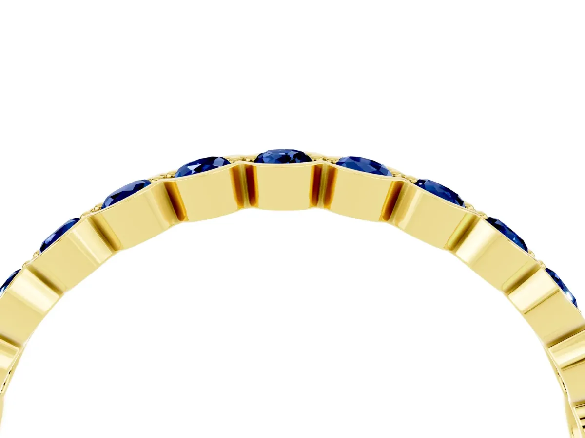 Round Blue Sapphire Bezel Set Eternity Band Yellow gold