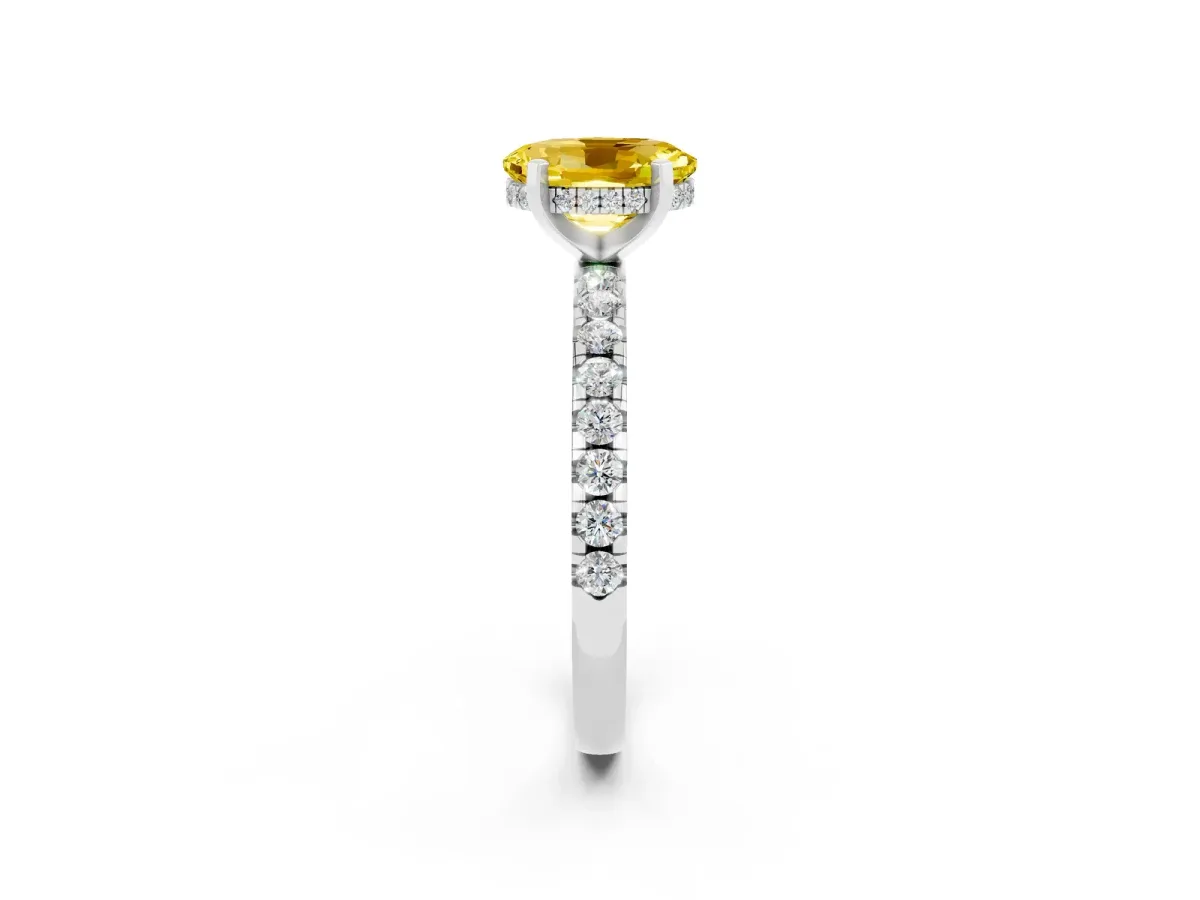 Oval Cut Yellow Sapphire Solitaire Ring with Round Pavé Band and Four-Prong Setting Silver
