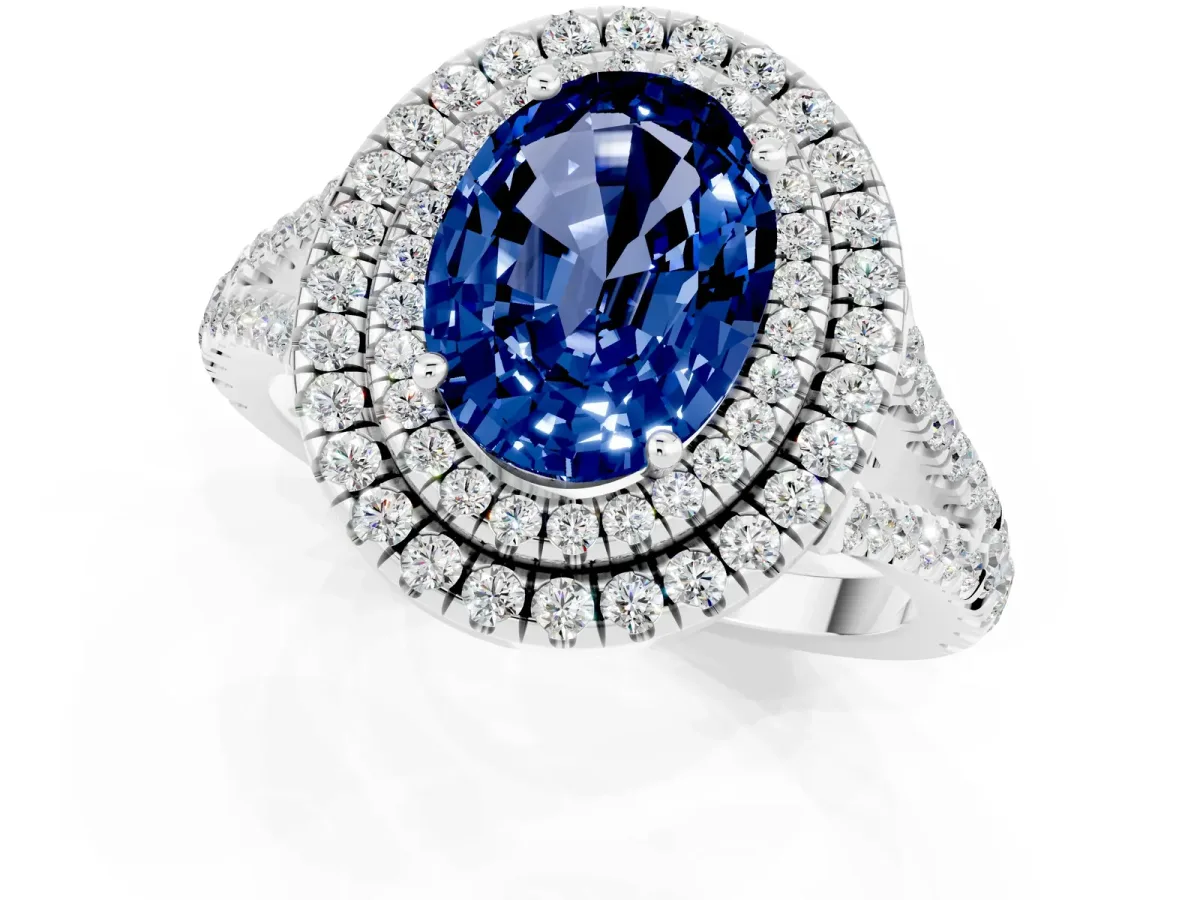 Oval Cut Blue Sapphire Double Halo Ring with Pavé Band and Prong Setting Silver