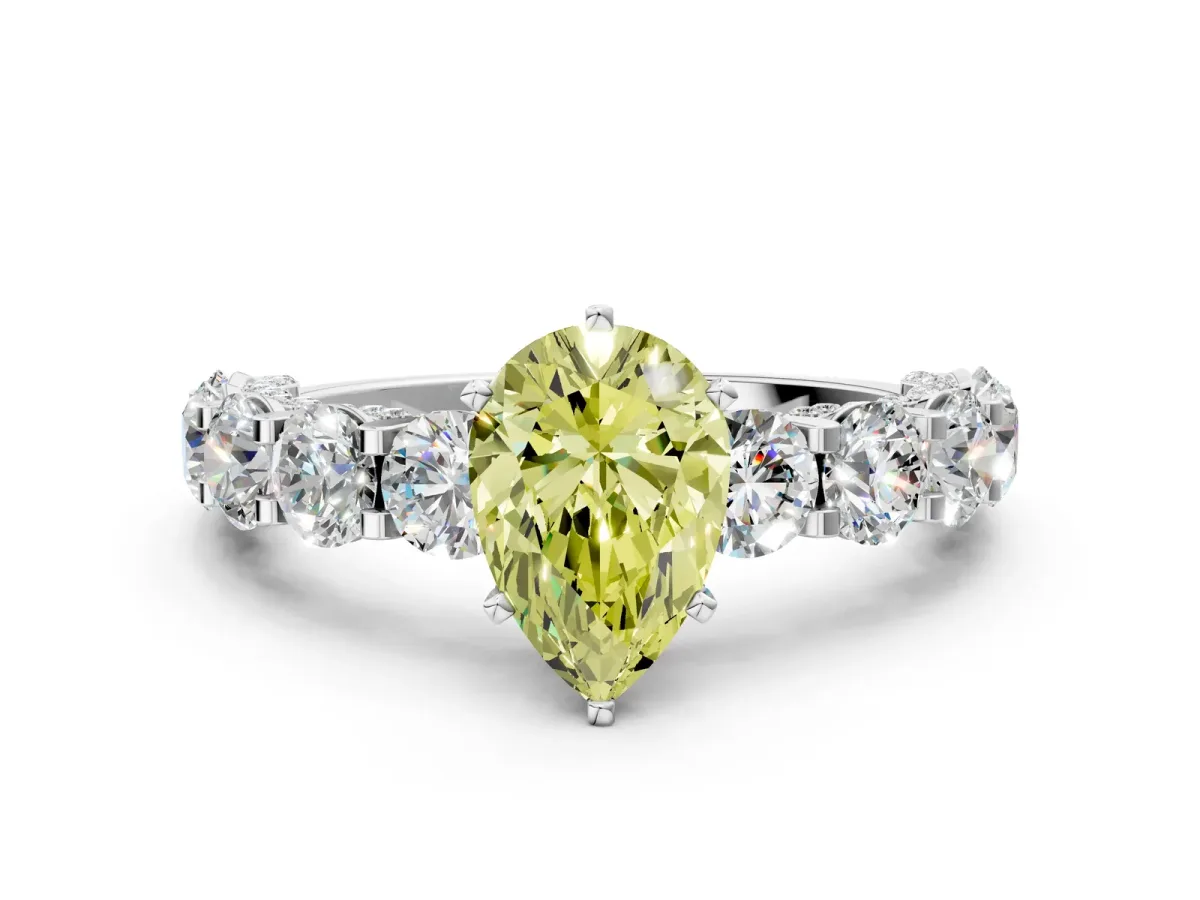 Fancy Yellow Pear Cut Diamond Side Stone Engagement Ring with Four-Prong Setting White gold