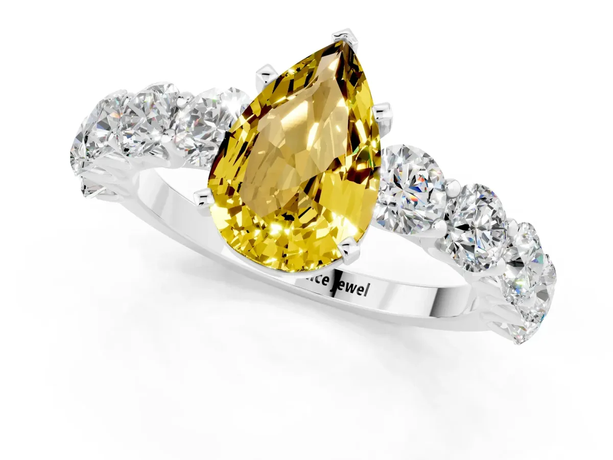 Pear Cut Yellow Sapphire Prong Setting with Side Stones on a Pave Band Silver