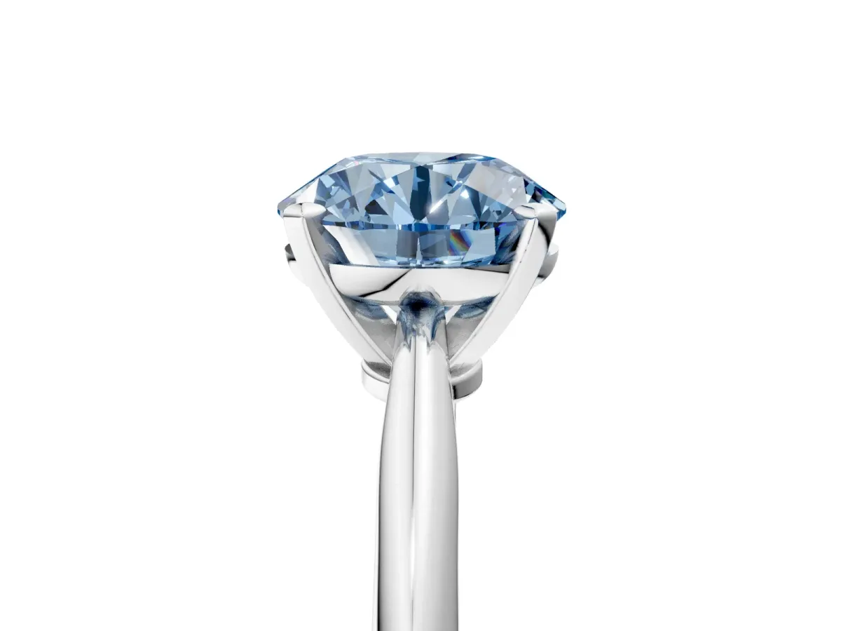 Fancy Blue Round Cut Diamond Solitaire Engagement Ring with Classic Band and Four-Prong Setting Silver
