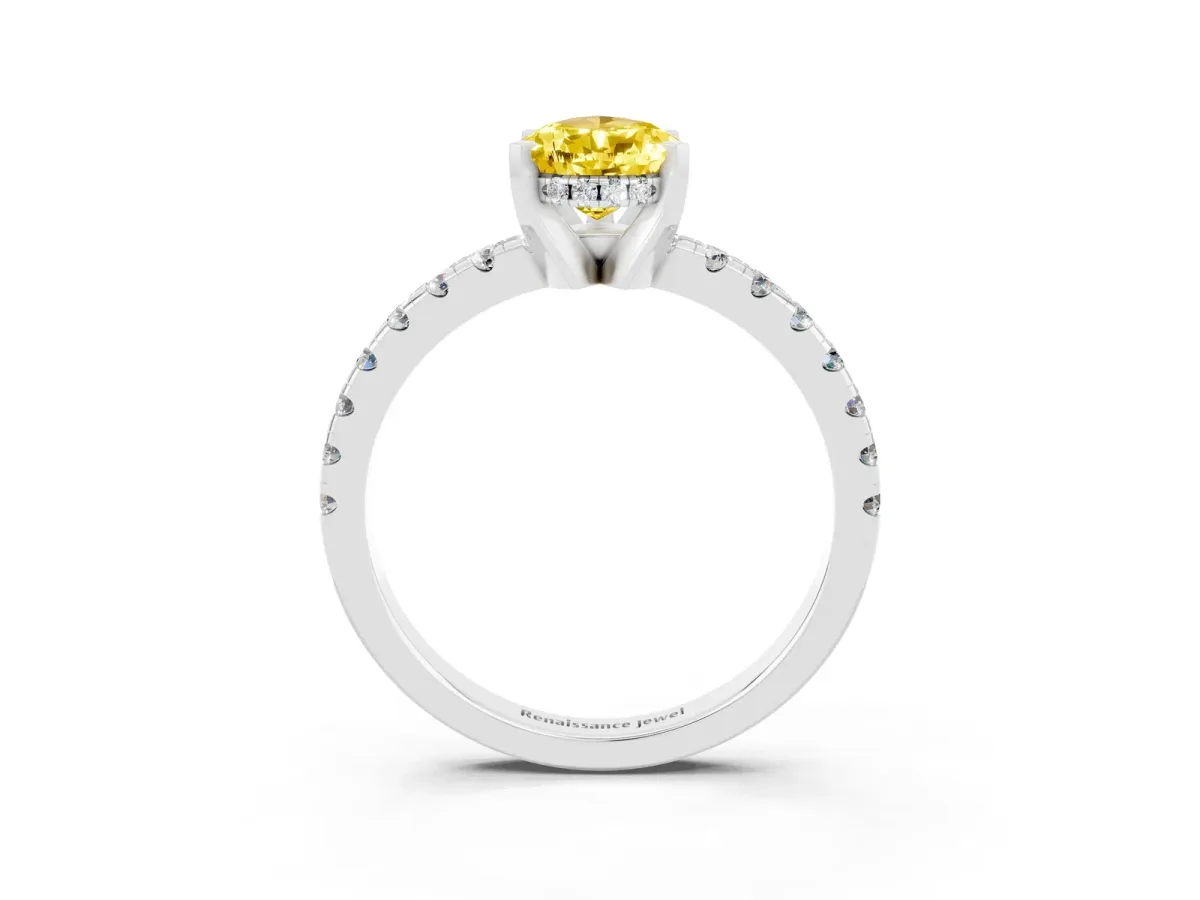 Pear Cut Yellow Sapphire Solitaire Ring with Round Pavé Band and Four-Prong Setting Silver