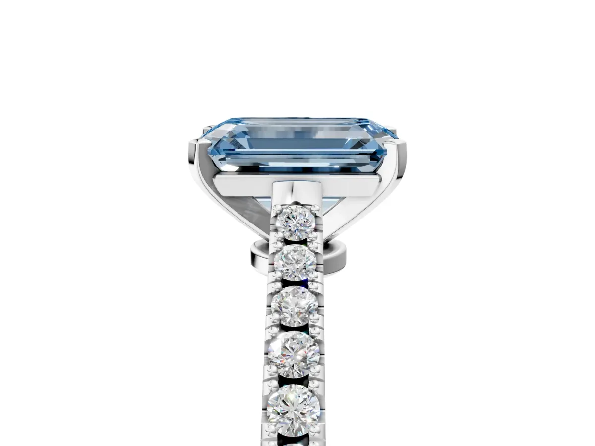 Fancy Blue Emerald Cut Cut Solitaire Diamond Engagement Ring with Pave Band and Four-Prong Setting Silver