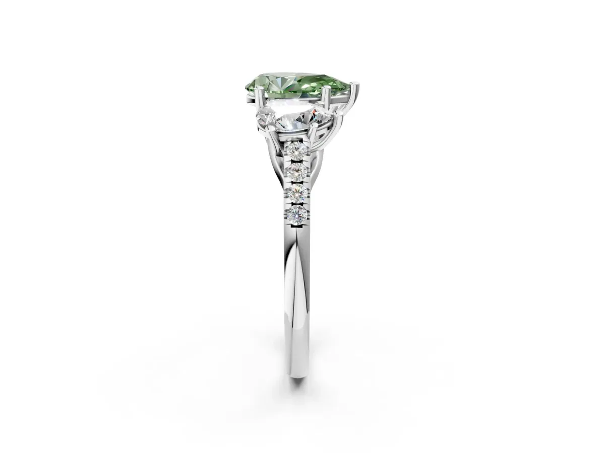 Fancy Green Three-Stone Pear Cut Diamond Ring with Round Pavé Band and Prong Setting Silver