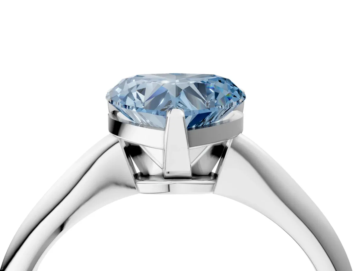 Fancy Blue Heart Cut Diamond Solitaire Engagement Ring with Classic Band and Four-Prong Setting Silver