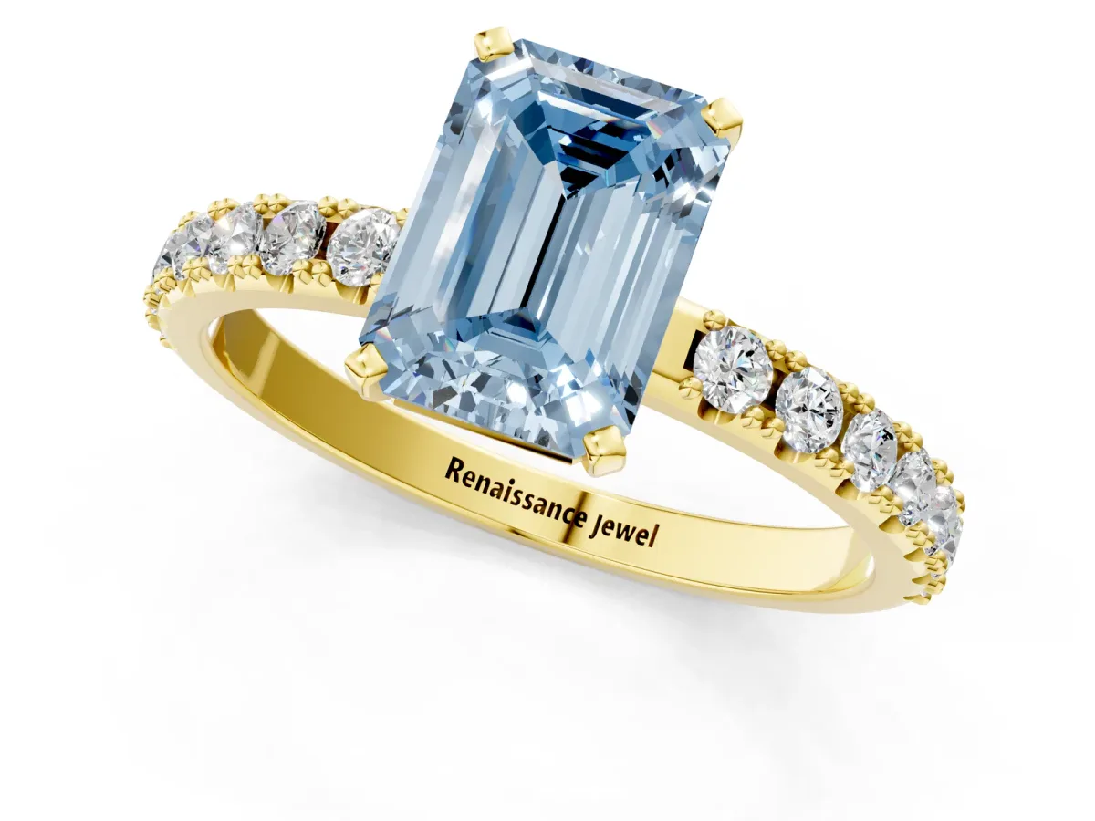 Fancy Blue Emerald Cut Diamond Solitaire Pavé Band with Four-Prong Setting Yellow gold