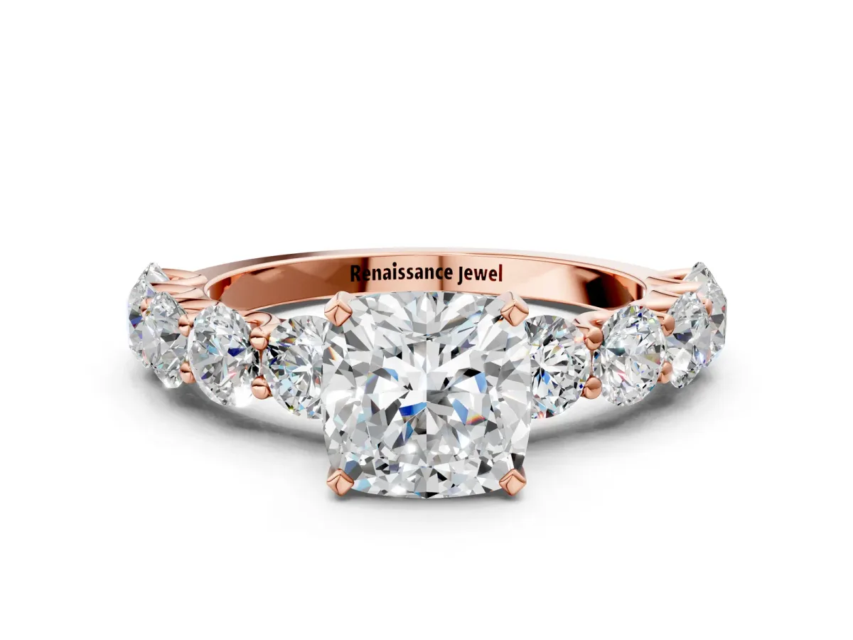 Cushion Cut Diamond Prong Setting with Side Stones on a Pave Band Rose gold