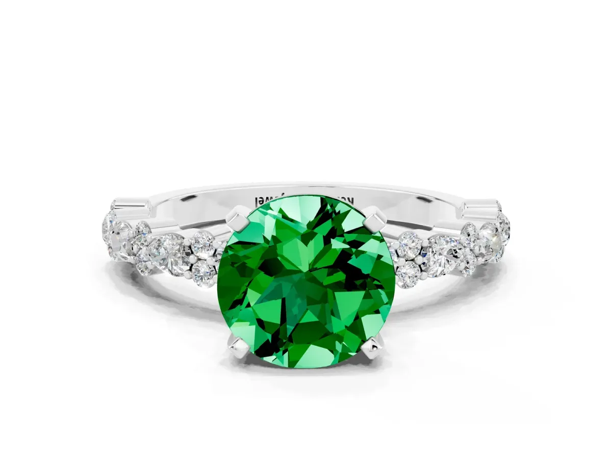Round Cut Emerald Side Stone Solitaire Ring with Round and Four-Prong Setting Silver