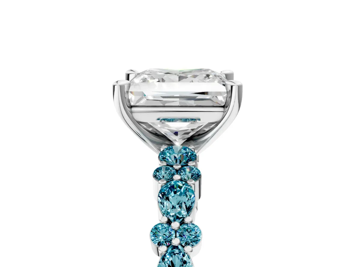 Princess Cut Diamond Side Stone Solitaire Ring with Round Blue Topaz and Four-Prong Setting Silver