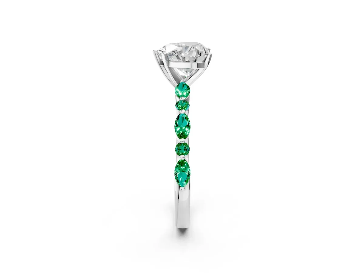 Heart Cut Diamond Ring with Marquise and Round Emerald Side Stones and Four-Prong Setting Silver