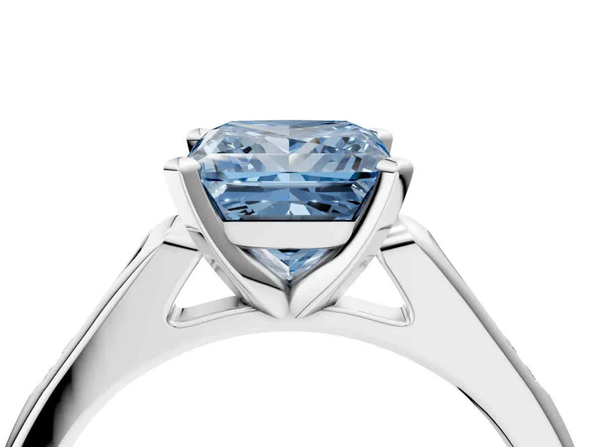Fancy Blue Princess Cut Diamond Solitaire Ring with Channel Set Round Band and Prong Setting Silver