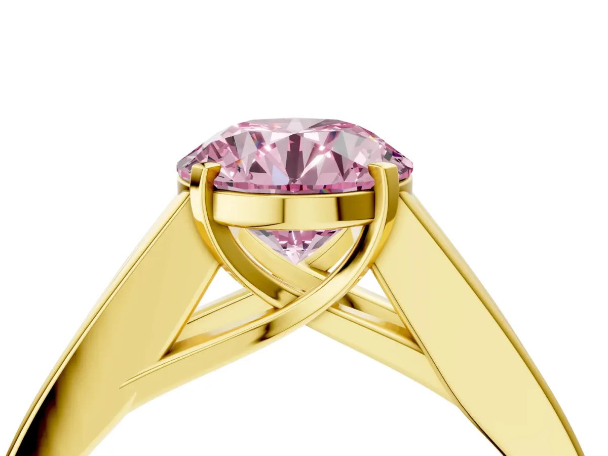 Fancy Pink Round Cut Cut Channel Set Solitaire Ring with Four-Prong Setting Yellow gold