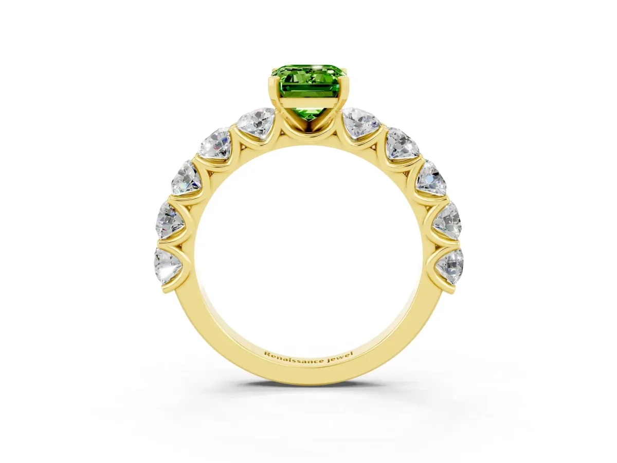 Emerald Cut Peridot Prong Setting with Side Stones on a Pave Band Yellow gold