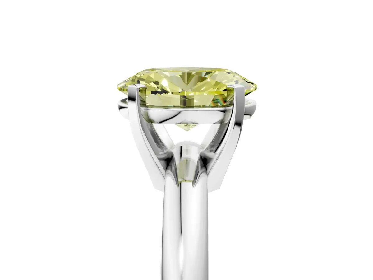 Fancy Yellow Oval Cut Diamond Solitaire Engagement Ring with Round Band and Four-Prong Setting Silver