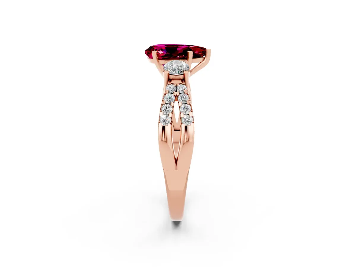 Pear Cut Garnet Three-Stone Ring with Pavé Split Shank and Four-Prong Setting Rose gold