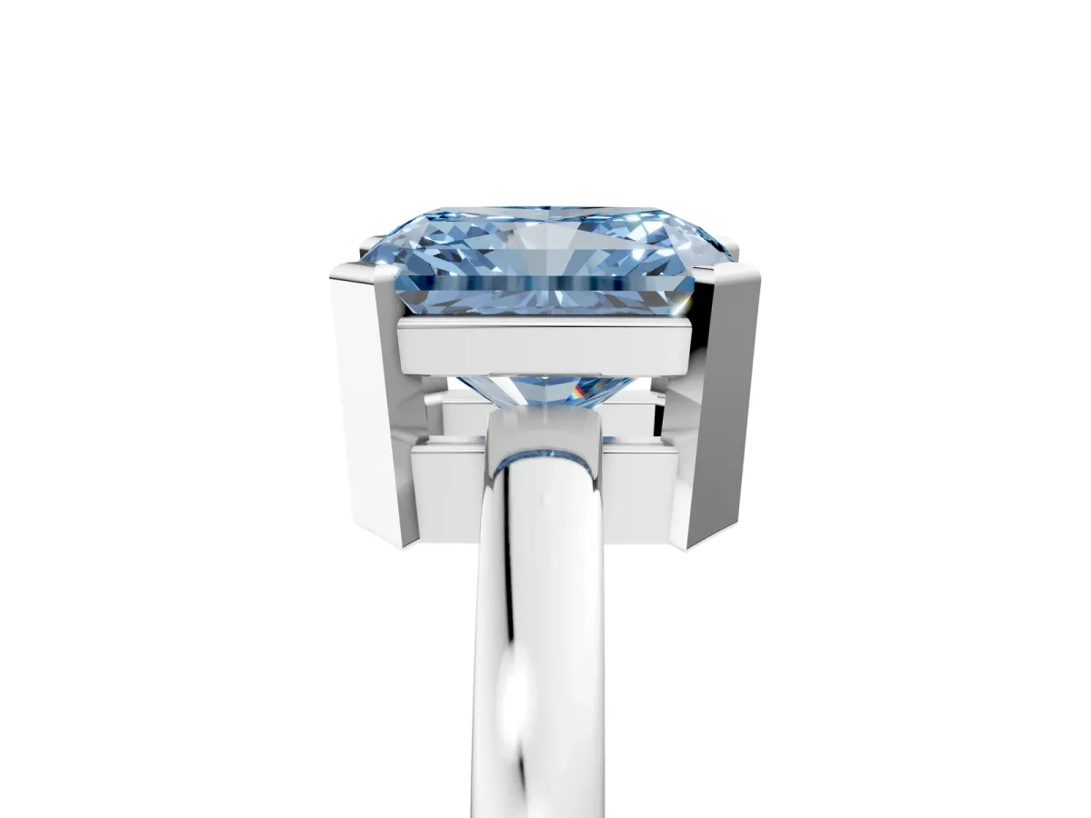 Fancy Blue Radiant Cut Cut Solitaire Ring with Four-Prong Setting and Classic Band Platinum