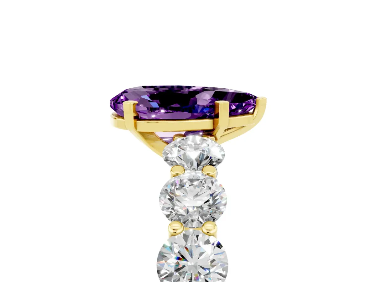 Pear Cut Amethyst Prong Setting with Side Stones on a Pave Band Yellow gold