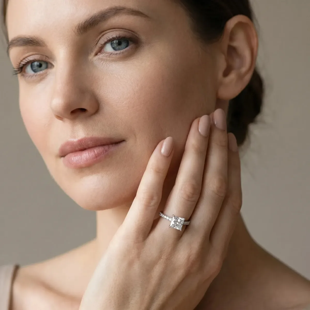 Princess Cut Diamond Solitaire Ring with Round Pavé Band and Four-Prong Setting Silver