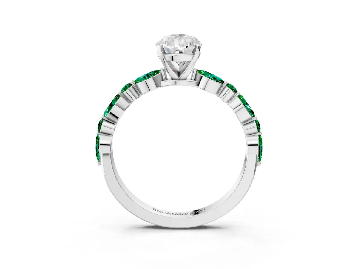 Pear Cut Diamond Ring with Marquise and Round Emerald Side Stones and Four-Prong Setting Silver