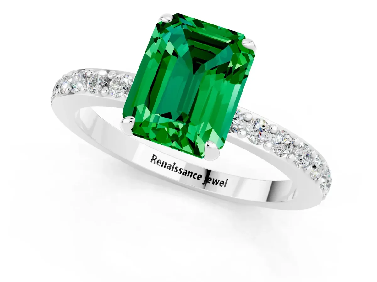 Emerald Cut Emerald Solitaire Engagement Ring with Pavé Band and Four-Prong Setting Silver