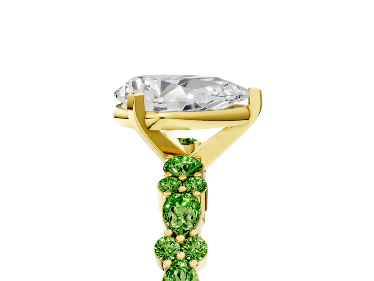 Pear Cut Diamond Side Stone Solitaire Ring with Round Peridot and Four-Prong Setting Yellow gold