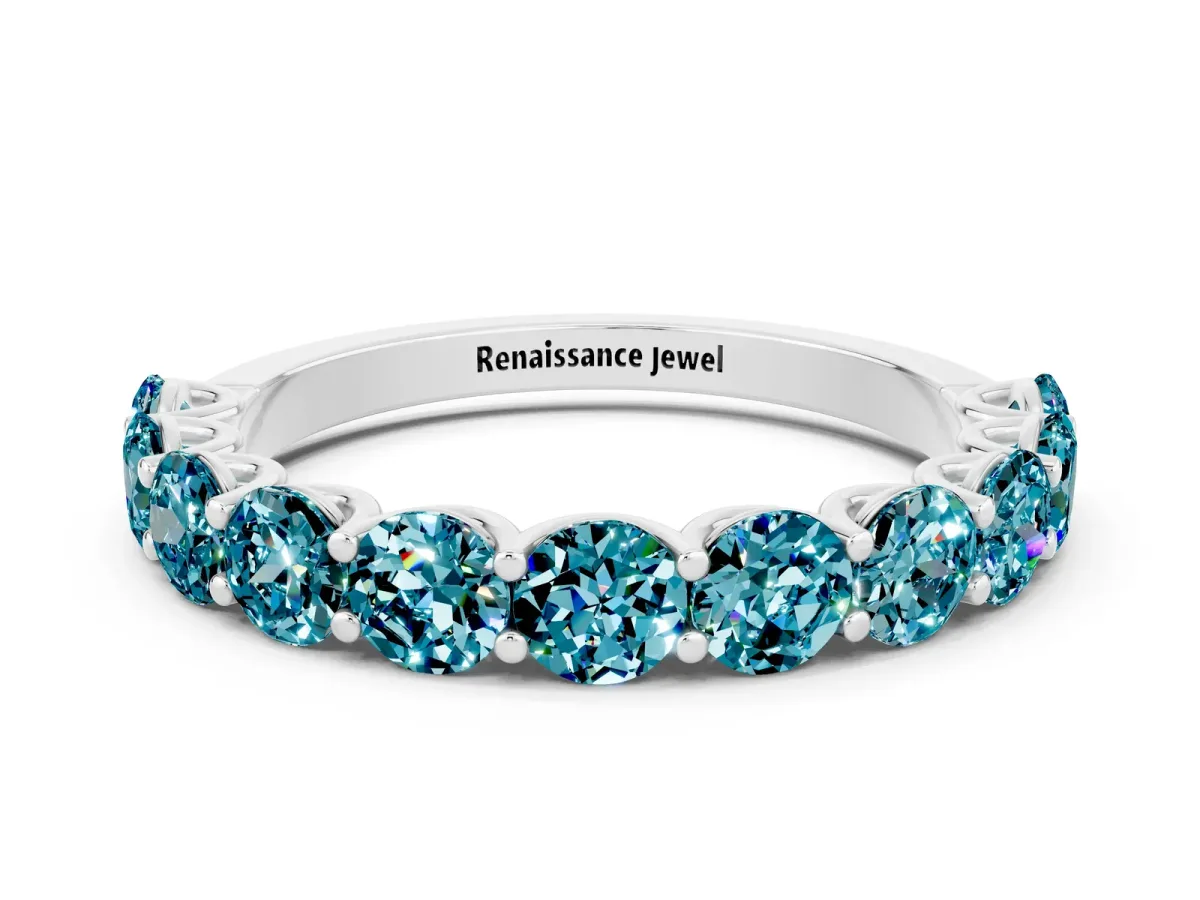 Round Blue Topaz Shared Prong Eternity Band Platinum