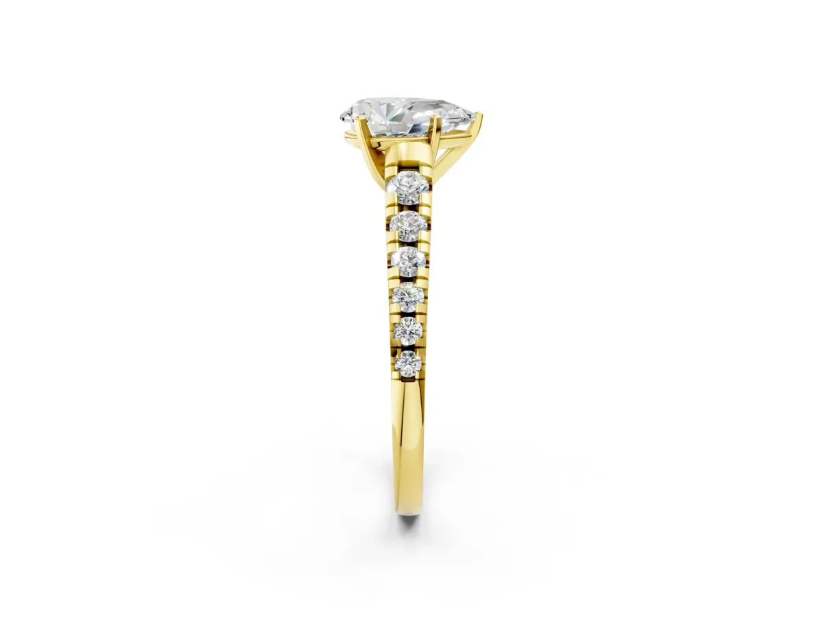 Pear Cut Diamond Cathedral Solitaire Ring with Round Pavé Band Yellow gold