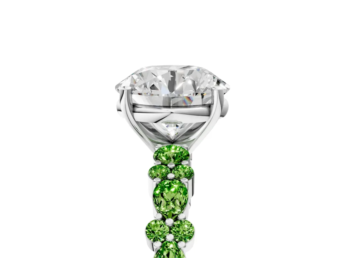 Round Cut Diamond Side Stone Solitaire Ring with Round Peridot and Four-Prong Setting Platinum