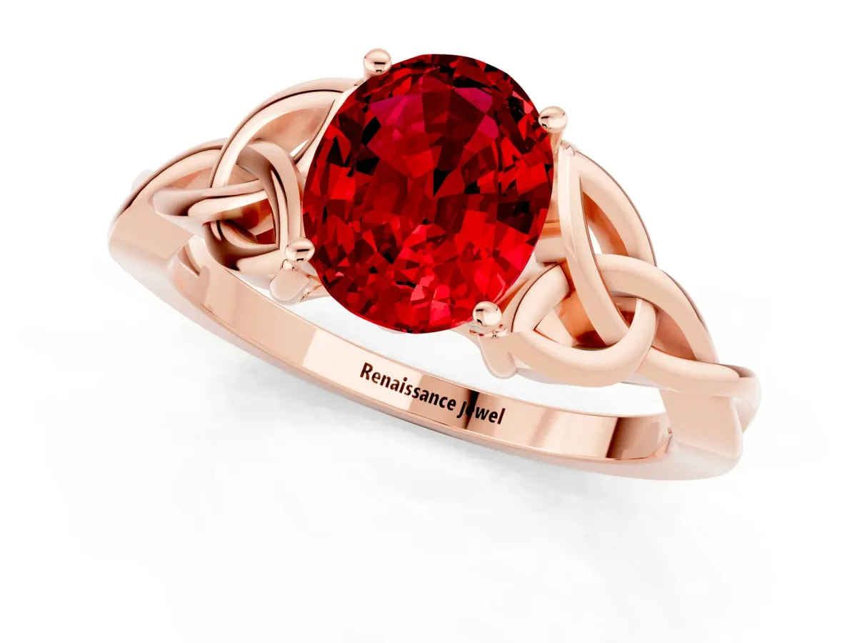 Oval Cut Ruby Solitaire Engagement Ring with Celtic Knot Band and Four-Prong Setting Rose gold