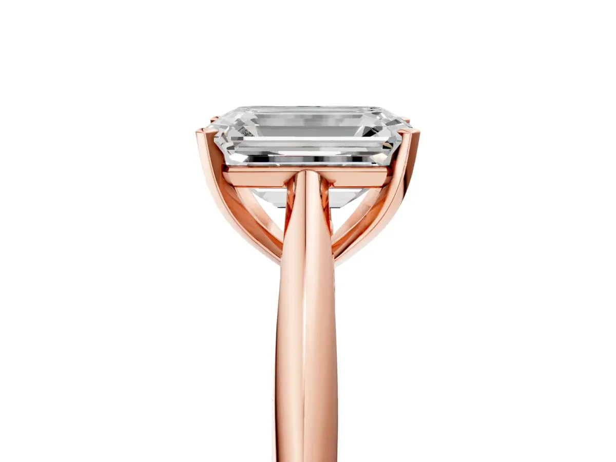 Emerald Cut Diamond Solitaire Engagement Ring with Cathedral Setting and Four-Prong Mount Rose gold