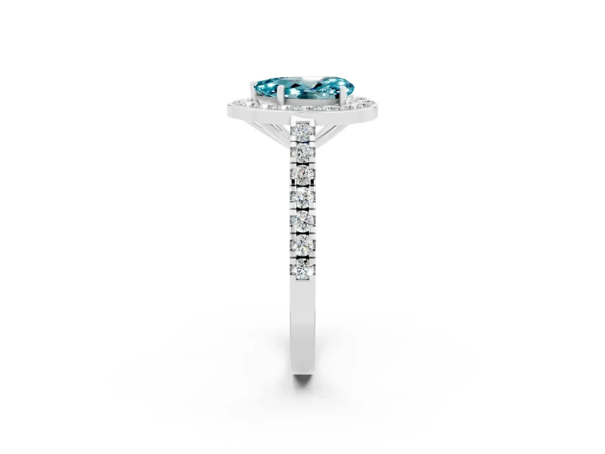 Pear Cut Blue Topaz Halo Ring with Round Pavé Split Shank and Prong Setting Platinum