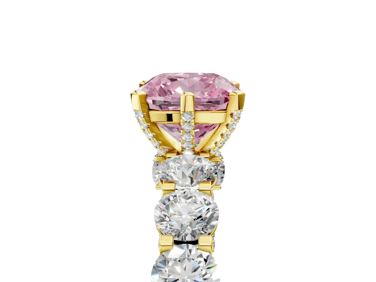 Fancy Pink Cushion Cut Diamond Side Stone Engagement Ring with Four-Prong Setting Yellow gold