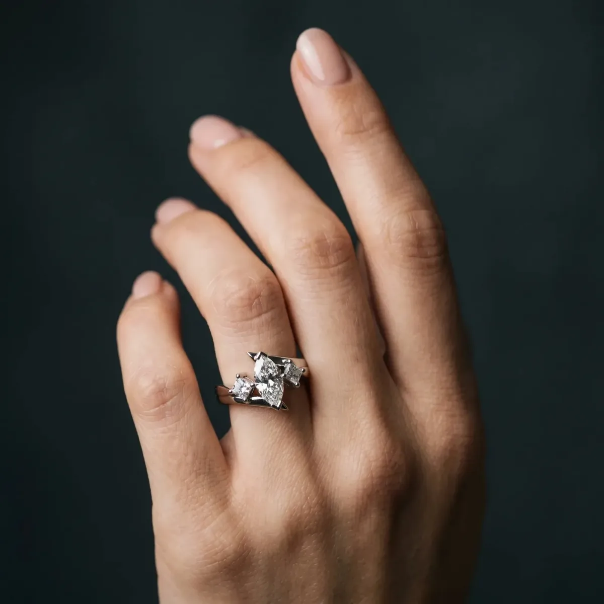 Three-Stone Marquise Cut Cut Tension Band Ring with Four-Prong Setting Platinum