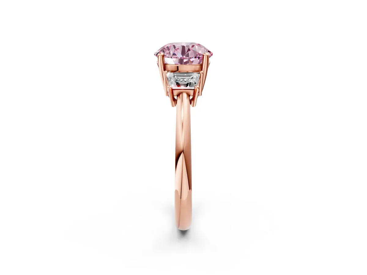Fancy Pink Round Cut Diamond Three-Stone Ring with Trapezoid Side Stones and Prong Setting Rose gold