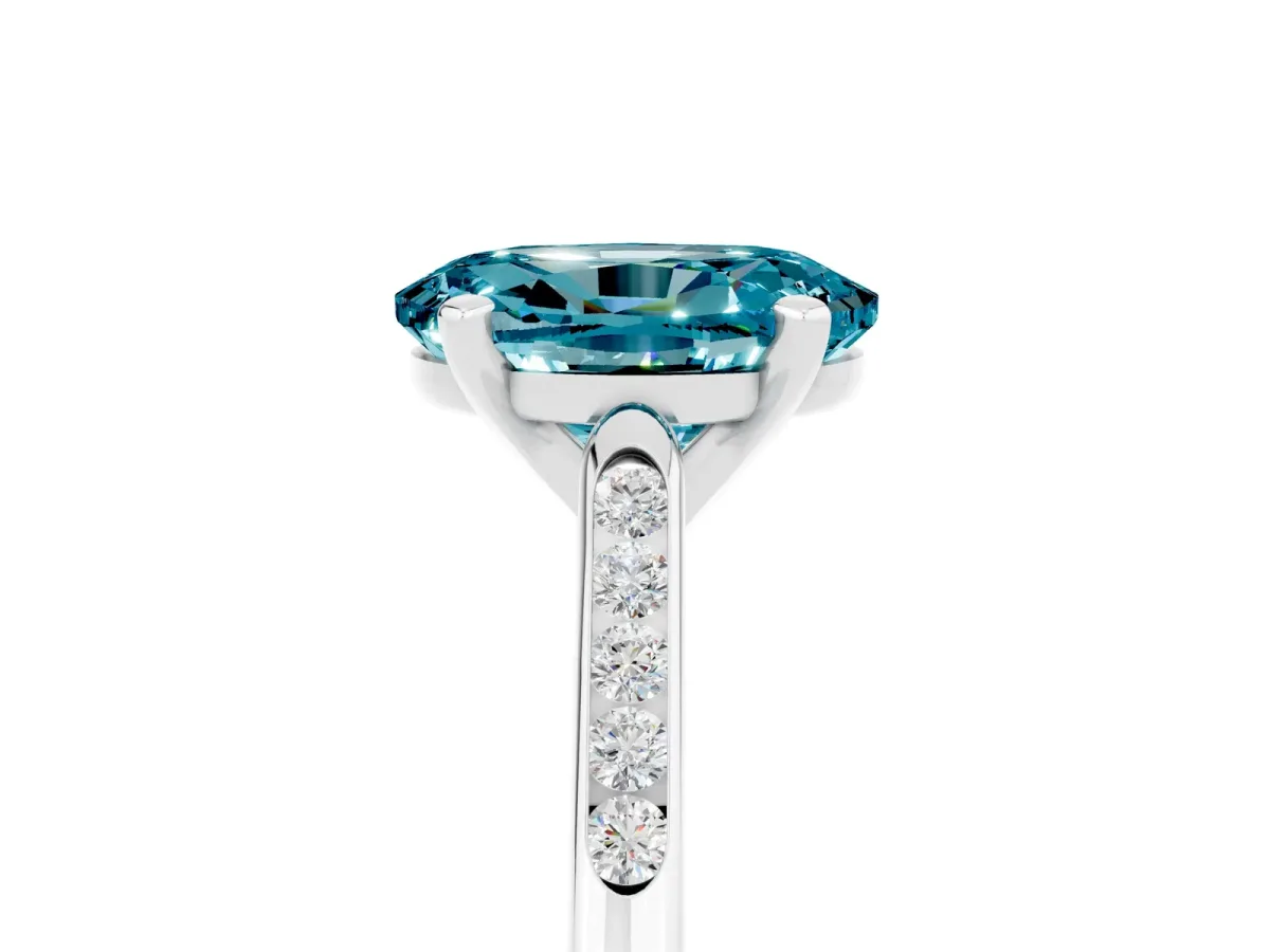 Oval Cut Blue Topaz Solitaire Ring with Channel Set Round Band and Prong Setting Silver