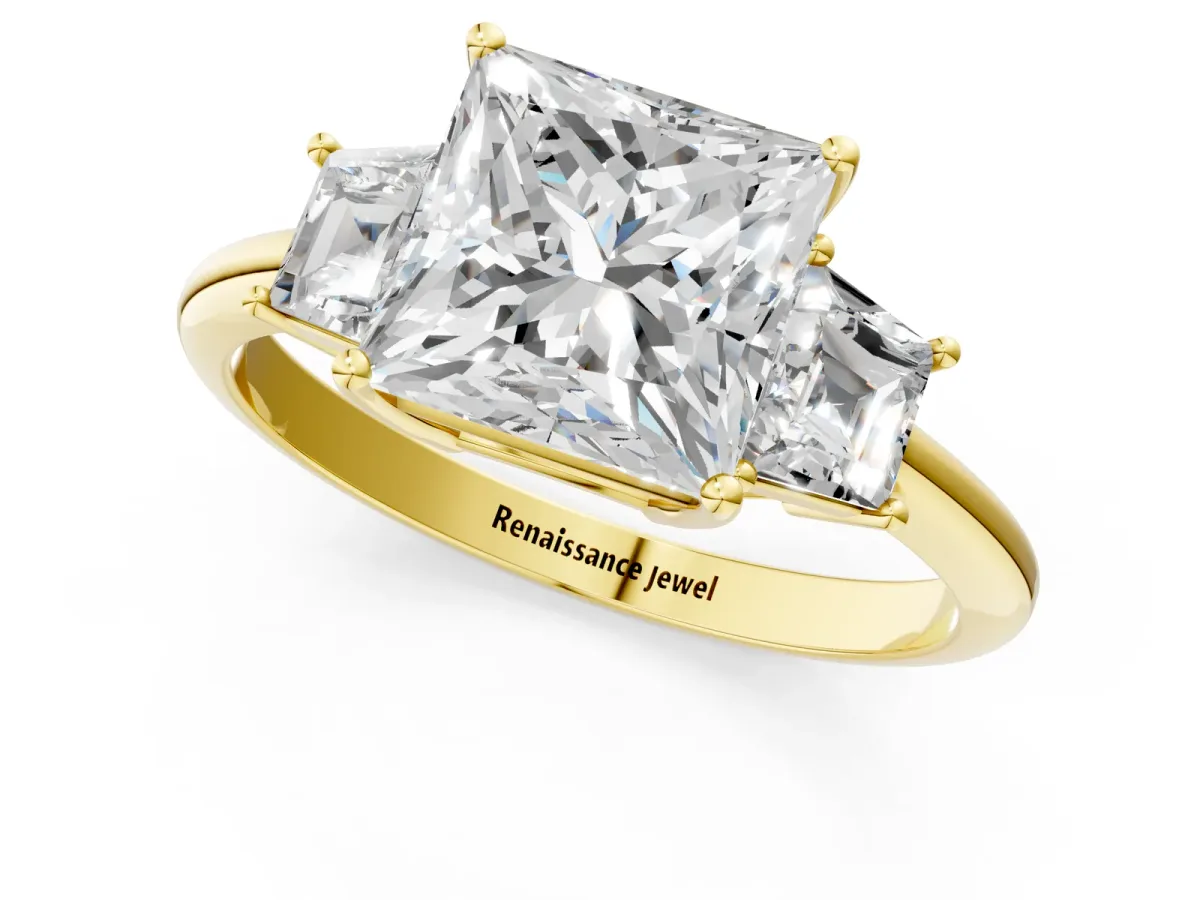 Princess Cut Diamond Three-Stone Ring with Trapezoid Side Stones and Prong Setting Yellow gold
